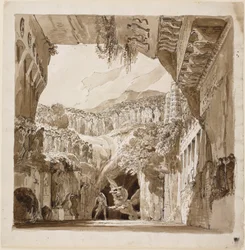 Bühnenbild mit einem Mann, der in einer Höhle gegen einen Drachen kämpft