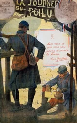Zwei französische Soldaten durchsuchen Pflegepakete von zu Hause.