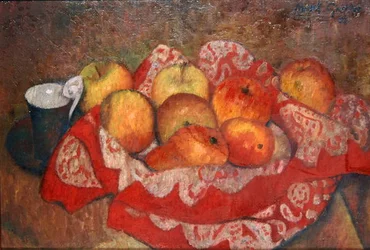 Äpfel und Birnen auf einem roten Tuch