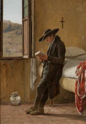 Junger Geistlicher beim Lesen