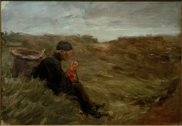 Sitzender Bauer in den Dünen