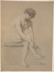 Sitzendes Modell auf niedriger Plinthe mit Kissen. Nach rechts gedreht. Herabhängende Arme. Gekreuzte Beine