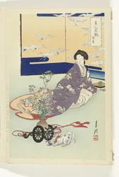 Hündchen spielt mit Blumenwagen