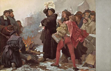 Martin Luther verbrennt die päpstliche Bulle, die ihm mit Exkommunikation droht, vor dem Elstertor in Wittenberg, Deutschland, 10. Dezember 1520