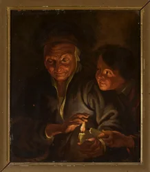 Alte Frau und Junge mit einer Kerze