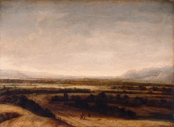 Flache Landschaft mit Blick auf ferne Hügel