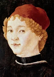 Porträt eines jungen Mannes mit rotem Hut