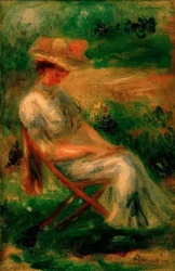 Sitzende Frau in einem Garten