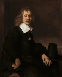 Ein junger Mann an einem Tisch (möglicherweise Govaert Flinck)