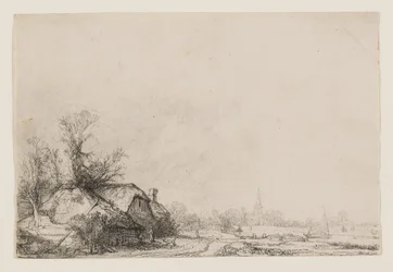 Häuser am Kanal mit Kirche und Segelboot