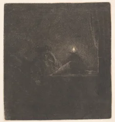 Student an einem Tisch bei Kerzenlicht