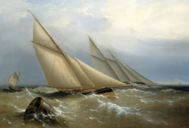 Eine Schoner- und Kutteryacht rundet eine Boje
