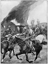 Britische Kolonialtruppen brennen die Farm eines rebellischen Buren nieder. Nach einem Gemälde von R. Caton Woodville. 2. Burenkrieg 1899-1902.