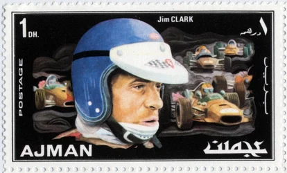 Briefmarke der Arabischen Emirate, die den schottischen Rennfahrer Jim Clark darstellt (1936-1968)
