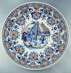 Chinoiserie. Fayenceteller mit chinesischem Dekor. Anonym