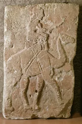 Relief mit Dromedarreiter