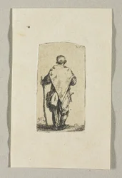 Stehender Mann in weißem Tuch