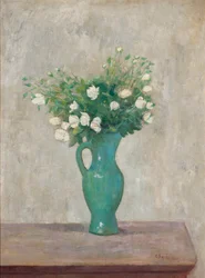 Blumenstrauß in einer grünen Vase
