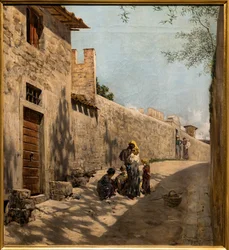 Kleine Straße in der Toskana mit Figuren