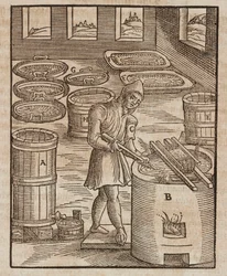 Ein Mann testet Salpeter, verwendet in Schießpulver und zur Konservierung von Fleisch - Gravur aus Beschreibung der Erze und der wichtigsten Bergbaumethoden, von Lazarus Ecker