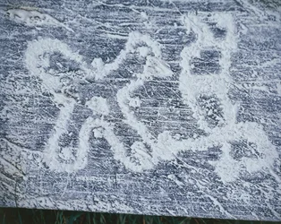 Camunische Rose, Kopie von Felsgravuren im Valcamonica-Tal