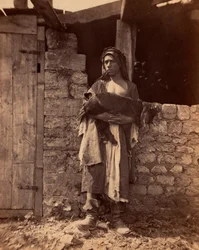 Patre aus dem Libanon mit einem Kind. Fotografie von Charles Lallemand (1826-1904) in „Syrien, Kostüme, Reisen und Landschaften“. 1865. Private Sammlung.