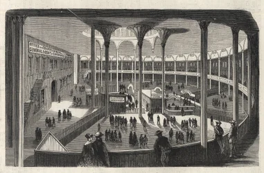 Das Innere eines Depots des Einwanderungszentrums von Castle Garden - New York State - Einwanderungskommission - Gravur in „The Illustrous Universe“ von 1869