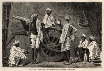 Bauern aus Scind (Punjab-Region, Indien), neben ihren landwirtschaftlichen Maschinen. Gravur zur Illustration der Reise nach Pandjab und Kaschmir, Geschichte von Guillaume Lejean, 1866, veröffentlicht in "Le tour du monde, nouveau journal des voyages"