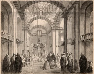 Gebete des Ramadan (muslimisches Fasten) in der Großen Moschee von Algier im Jahr 1862. Gravur in „Le Monde illustré“ von 1862. Private Sammlung.
