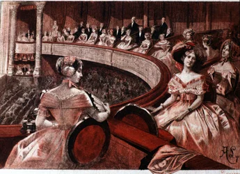 Das Publikum auf einem Balkon im Theater.