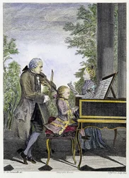 Wolfgang Amadeus Mozart als Kind am Klavier, umgeben von seinem Vater Leopold an der Geige und seiner Schwester Marianne beim Singen - Gravur