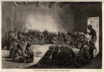 Eine Mahlzeit bei den Turkmenen (Irak). Zeichnung von Emile Bayard (1837-1891), zur Illustration der Reise nach Zentralasien im Jahr 1863 von Arminius Vambery (ungarischer Wissenschaftler verkleidet als Derwisch). Gravur in „Le tour du monde“, herausgegebe
