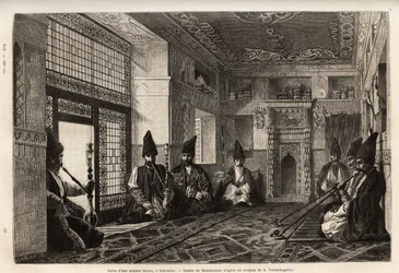 Das Wohnzimmer eines reichen Tatarenhauses in Schuscha (Transkaukasien, Russland), wo sich Männer auf Teppichen versammeln, um Pfeife zu rauchen und zu plaudern. Gravur zur Illustration der Reise in die Provinzen des Kaukasus, von Basile Vereschaguine, 186