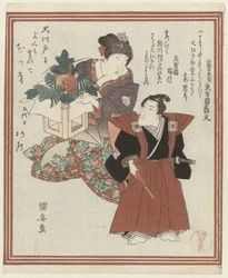 Zwei Schauspieler bei Neujahrsdekoration