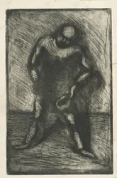 Mann mit gespreizten Beinen und Hut in der Hand