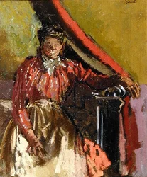 Frau auf einem Bett sitzend