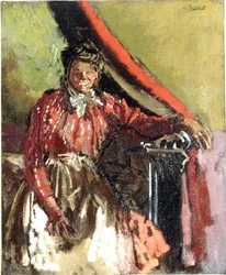 Frau, die auf einem Bett sitzt