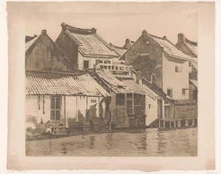 Rückfassaden von Häusern an einem Fluss in Batavia