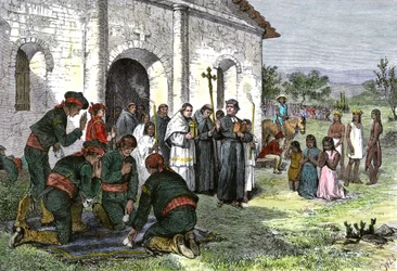Spanische Mission nach Kalifornien, mit Priestern, Soldaten und amerikanischen Indianern, die vor der Kirche im 18. Jahrhundert beten
